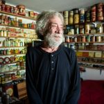 Daniel Weiss, 73, inside his “tin room” at his home that holds the majority of his expansive tin collection on Thursday, Oct. 12, 2023 in Mountlake, Washington. (Olivia Vanni / The Herald)