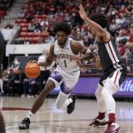 Washington forward Keion Brooks Jr. (1) drives to the basket against Washington State during a game Feb. 11 in Pullman. (AP Photo/Dean Hare)
