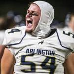 Arlington's Nolan Welch-Downing yells after forcing a turnover during the game against Stanwood on Friday, Sept. 29, 2023 in Stanwood, Washington. (Olivia Vanni / The Herald)