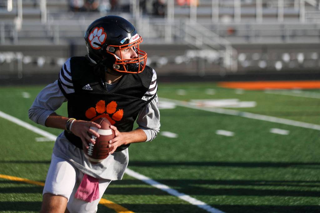 Senior quarterback Kaden LaPlaunt practices Wednesday at Granite Falls High School. (Annie Barker / The Herald)