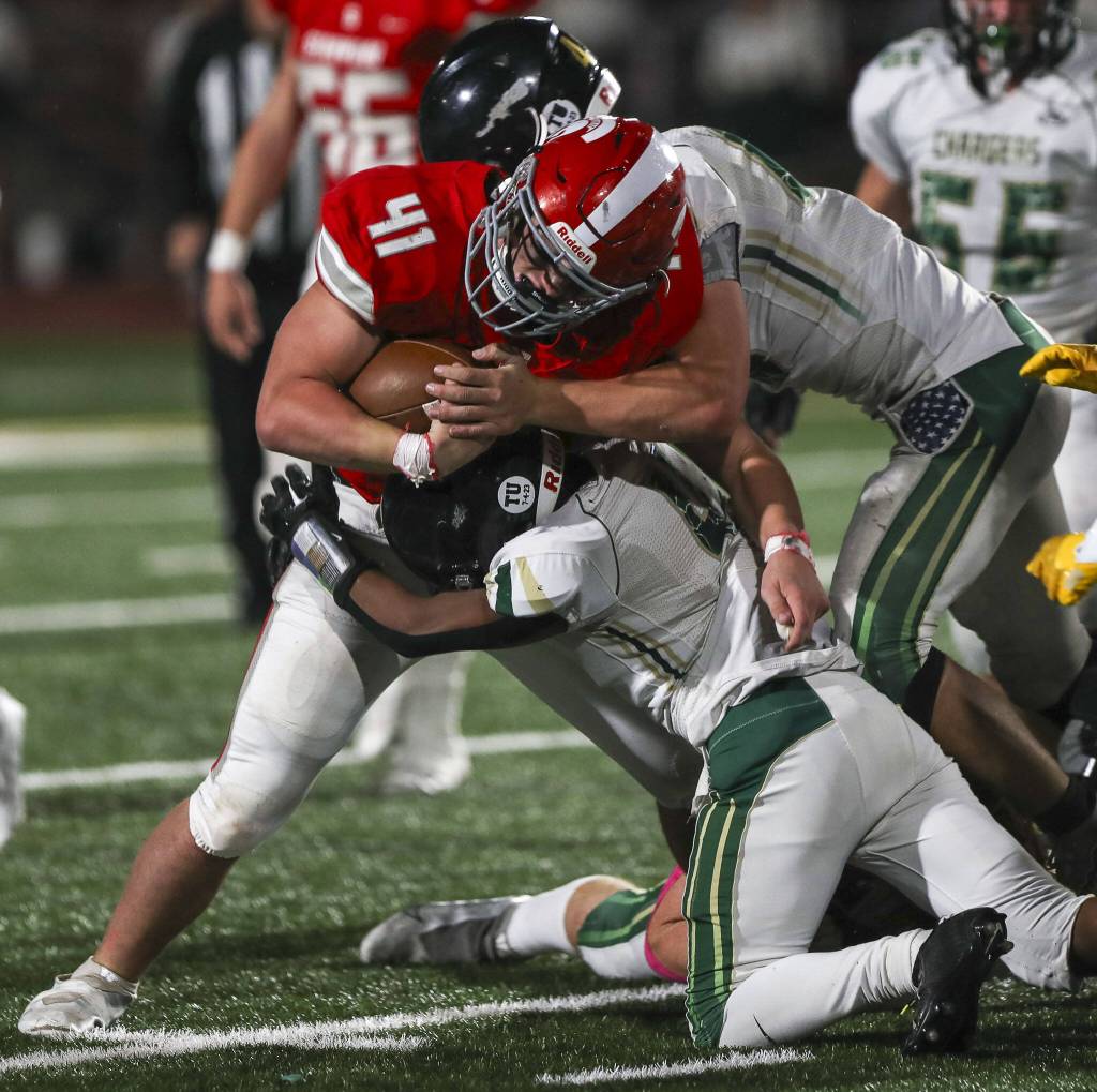 Stanwoods Silas Turpin (41) moves with the ball during a game between Marysville-Getchell and Stanwood at Stanwood High School in Stanwood, Washington on Friday, Oct. 13, 2023. Marysville-Getchell won, 21-20. (Annie Barker / The Herald)