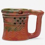 George E. Ohrs pottery can be recognized by its thin clay, vividly colored glaze and an overall sense of eccentricity.