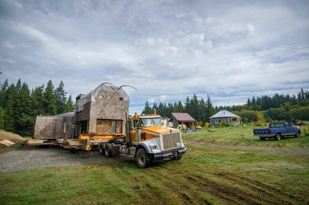 The house arrives at the couples Whidbey Island property. (Photo by David Welton)