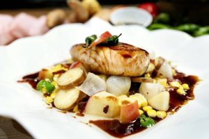 Honey Miso Glazed Black Cod with Spicy Bacon-Apple and Padron Pepper Succotash (Tulalip Resort Casino)