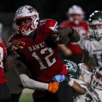 Mountlake Terraces Zaveon Jones (12) moves with the ball during a game between Edmonds-Woodway and Mountlake Terrace at Edmonds-Woodway Stadium in Edmonds, Washington on Friday, Oct. 20, 2023. Edmonds-Woodway won, 13-10. (Annie Barker / The Herald)