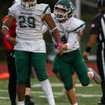 Edmonds-Woodways Rashaad Gerona-Chatters (29) reacts to scoring during a game between Edmonds-Woodway and Mountlake Terrace at Edmonds-Woodway Stadium in Edmonds, Washington on Friday, Oct. 20, 2023. Edmonds-Woodway won, 13-10. (Annie Barker / The Herald)