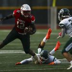 Mountlake Terraces Zaveon Jones (12) moves with the ball during a game between Edmonds-Woodway and Mountlake Terrace at Edmonds-Woodway Stadium in Edmonds, Washington on Friday, Oct. 20, 2023. Edmonds-Woodway won, 13-10. (Annie Barker / The Herald)