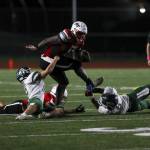Mountlake Terraces Zaveon Jones (12) moves with the ball during a game between Edmonds-Woodway and Mountlake Terrace at Edmonds-Woodway Stadium in Edmonds, Washington on Friday, Oct. 20, 2023. Edmonds-Woodway won, 13-10. (Annie Barker / The Herald)