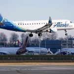 An Alaska Airline plane lands at Paine Field Saturday on Jan. 23, 2021. (Kevin Clark/Herald file photo)