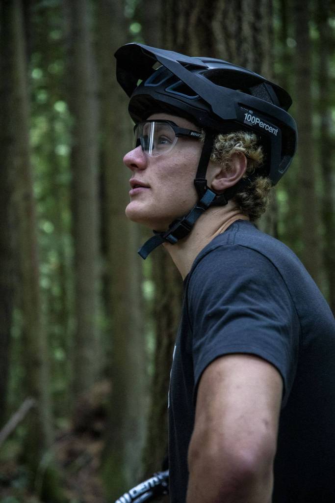 Alden Pate, 19, an international class mountain biker, poses for a photo while training Oct. 15 in Bellingham. (Annie Barker / The Herald)