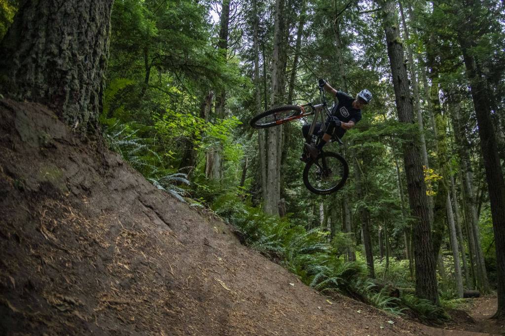 Alden Pate, 19, an international class mountain biker, trains Oct. 15 in Bellingham. (Annie Barker / The Herald)