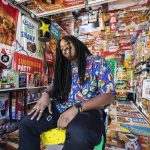 Jaxen McInnis, 26, the creator of the Snackin Shack, in his transformed alley garage in downtown Everett. (Olivia Vanni / The Herald)