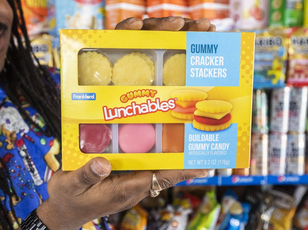 Jaxen McInnis holds a gummy Lunchables set. (Olivia Vanni / The Herald)