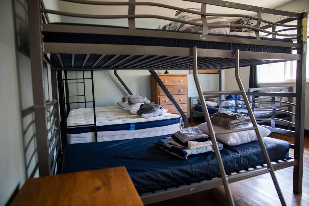 Beds in one of the rooms at the Everett Gospel Missions family shelter await residents on Tuesday, Oct. 3, 2023 in Everett, Washington. (Olivia Vanni / The Herald)