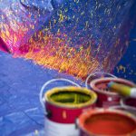 Paint splatter marks the outline of a canvas. (Olivia Vanni / The Herald)