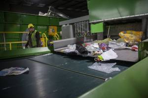 Items are sorted for recycling inside the Waste Management Cascade Recycling Center in Woodinville, Washington on Wednesday, Nov. 1, 2023. (Annie Barker / The Herald)