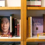 An assortment of books line the shelves at East West Books & Gifts on Friday, Oct. 27, 2023, in Edmonds, Washington. (Ryan Berry / The Herald)