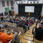 The community gathers during a meeting for public comment on the topic of bringing grizzly bears to the North Cascades at Darrington High School Auditorium in Darrington, Washington on Thursday, Nov. 2, 2023. (Annie Barker / The Herald)