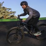 Landon Oliphant, 10, rides a new pump track for bikes at Jennings Nature Park in Marysville. (Annie Barker / The Herald)
