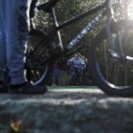 Kids, teens and adults try out a new pump track for bikes at Jennings Nature Park in Marysville. (Annie Barker / The Herald)