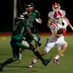 Marysville Pilchuck sophomore Marcus Gaffney takes a short pass for big yardage against Marysville Getchell during the Berry Bowl on Sept. 15 in Marysville. (Ryan Berry / The Herald)