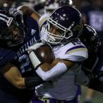 Lake Stevens Talha Rai fights through tacklers against Glacier Peak on Oct. 27 in Snohomish. (Annie Barker / The Herald)
