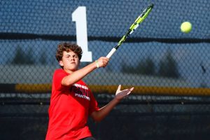 Snohomish’s Cade Strickland returns a ball against Edmonds-Woodway on Wednesday, Sept. 13, 2023, at Snohomish High School in Snohomish, Washington. (Ryan Berry / The Herald)