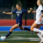Everett midfielder Sienna Kuehn clears the ball from the box during a district playoff matchup against Oak Harbor on Thursday, Nov. 2, 2023, at Shoreline Stadium in Shoreline, Washington. (Ryan Berry / The Herald)