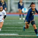 Everett senior Genesis Molina Escobar chases down a loose ball during a district playoff matchup against Oak Harbor on Thursday, Nov. 2, 2023, at Shoreline Stadium in Shoreline, Washington. (Ryan Berry / The Herald)