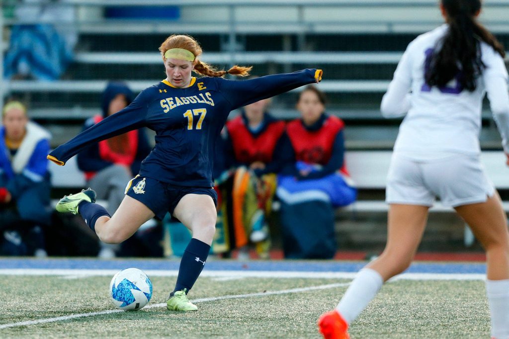 Everetts Sophia Munro sends the ball upfield during a district playoff matchup against Oak Harbor on Thursday, Nov. 2, 2023, at Shoreline Stadium in Shoreline, Washington. (Ryan Berry / The Herald)