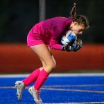 Everett goalie Emerson Hammer collects a shot during a district playoff matchup against Oak Harbor on Thursday, Nov. 2, 2023, at Shoreline Stadium in Shoreline, Washington. (Ryan Berry / The Herald)