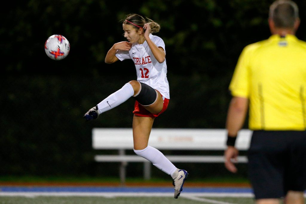Mountlake Terrace junior Ava Hunt keeps a clearing attempt from getting by during a district playoff matchup against Ferndale on Thursday, Nov. 2, 2023, at Shoreline Stadium in Shoreline, Washington. (Ryan Berry / The Herald)