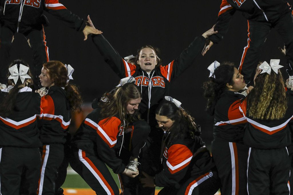 Granite Falls cheerleaders perfrom during a game between Granite Falls and Nooksack Valley at Granite Falls High School in Granite Falls, Washington on Friday, Nov. 3, 2023. Nooksack Valley won, 56-0. (Annie Barker / The Herald)