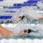 Jacksons Olivia Hoyla swims her way to a win in the 100 yard backstroke during the Wesco 4A District 1 Girls Swim and Dive Finals on Saturday, Nov. 4, 2023, at the Snohomish Aquatic Center in Snohomish, Washington. (Ryan Berry / The Herald)