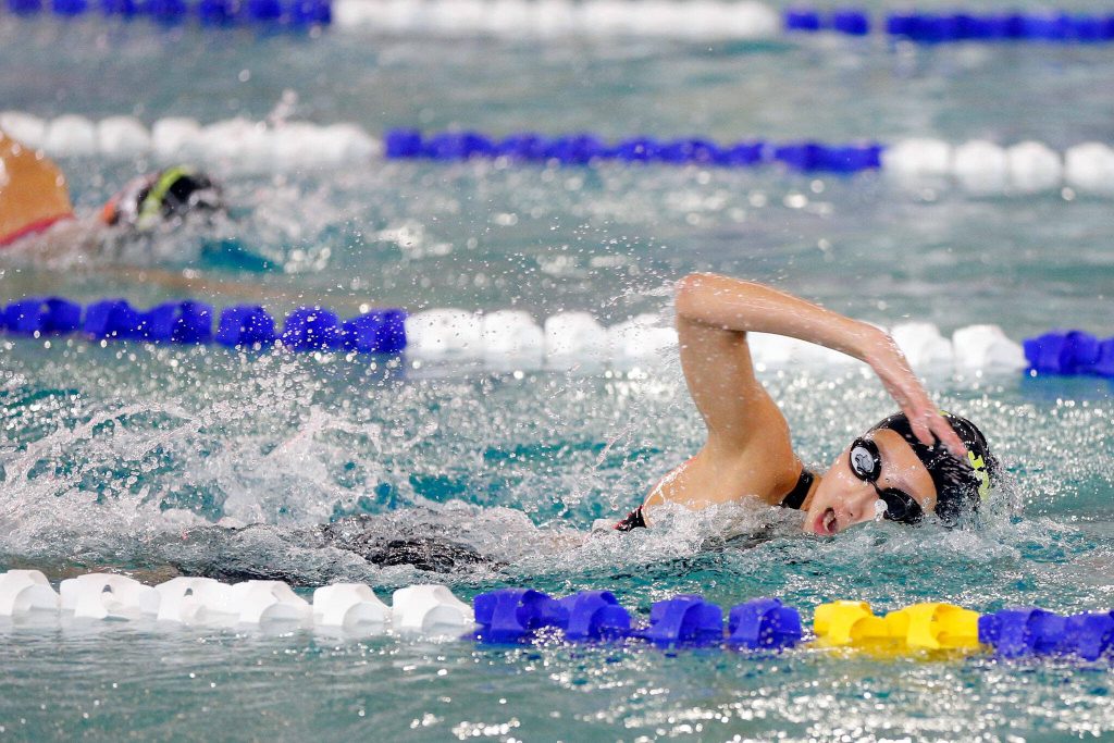 Jackson sophomore Julia Song takes first in the 100 yard freestyle during the Wesco 4A District 1 Girls Swim and Dive Finals on Saturday, Nov. 4, 2023, at the Snohomish Aquatic Center in Snohomish, Washington. (Ryan Berry / The Herald)