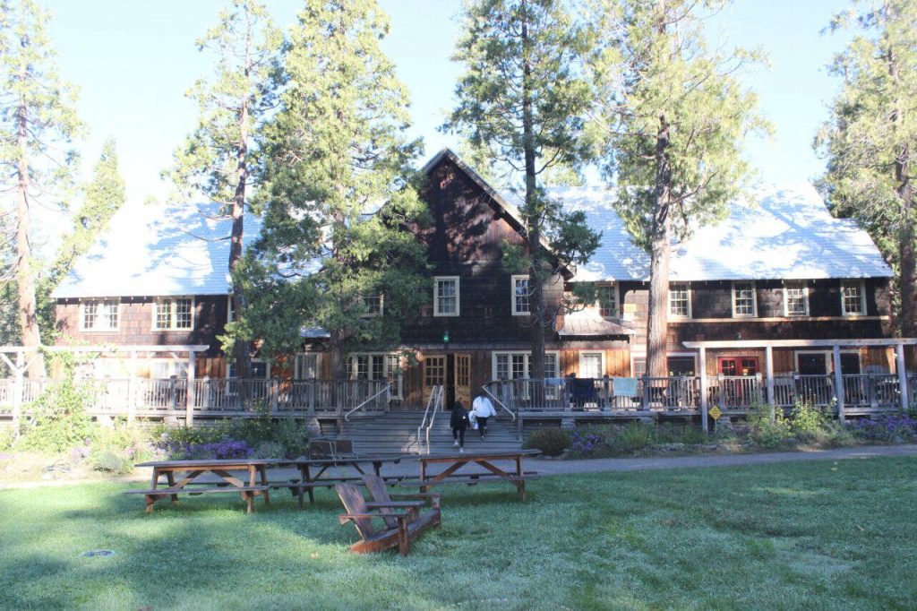 The historic lodge at Breitenbush Hot Springs serves three daily meals, all vegetarian, and provides a gathering space for guests. (Gregory Scruggs / The Seattle Times)