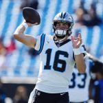 Quarterback Jacob Eason warms up prior to the start of a game while playing for the Carolina Panthers on Oct. 23, 2022, in Charlotte, N.C. Eason was signed to the New York Giants practice squad Tuesday. (AP Photo/Jacob Kupferman)
