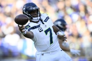 Seattle Seahawks quarterback Geno Smith throws a pass during the second half of an NFL football game against the Baltimore Ravens, Sunday, Nov. 5, 2023, in Baltimore. (AP Photo/Nick Wass)
