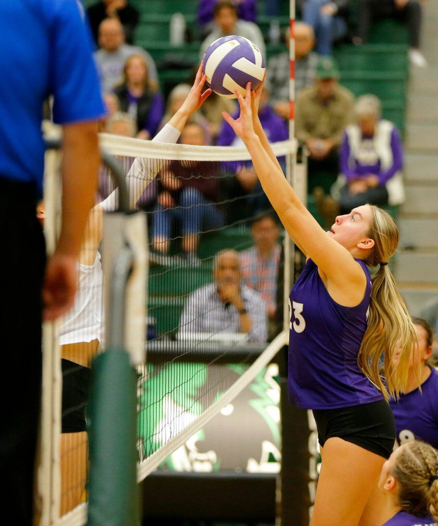 Lake Stevens Kamryn Strom blocks the ball against North Creek during the Wesco 4A district 1/2 championship match Saturday, Nov. 11, 2023, at Henry M. Jackson High School in Mill Creek, Washington. (Ryan Berry / The Herald)