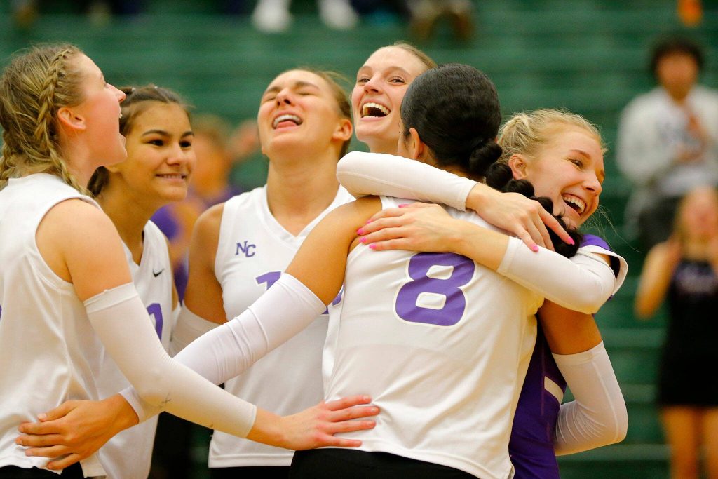 North Creek celebrates after forcing a fifth set against Lake Stevens during the Wesco 4A district 1/2 championship match Saturday, Nov. 11, 2023, at Henry M. Jackson High School in Mill Creek, Washington. (Ryan Berry / The Herald)