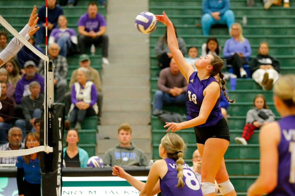 Lake Stevens Mia Turner sends the ball over the net against North Creek during the Wesco 4A district 1/2 championship match Saturday, Nov. 11, 2023, at Henry M. Jackson High School in Mill Creek, Washington. (Ryan Berry / The Herald)