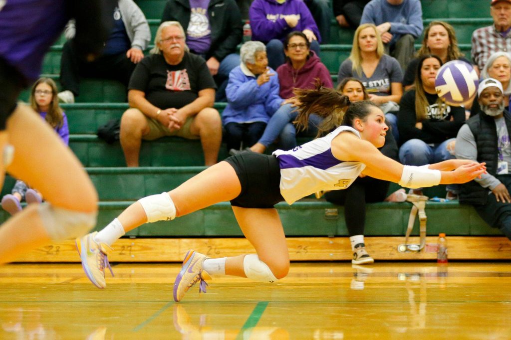 Lake Stevens Alyss Kelly makes a diving save against North Creek during the Wesco 4A district 1/2 championship match Saturday, Nov. 11, 2023, at Henry M. Jackson High School in Mill Creek, Washington. (Ryan Berry / The Herald)