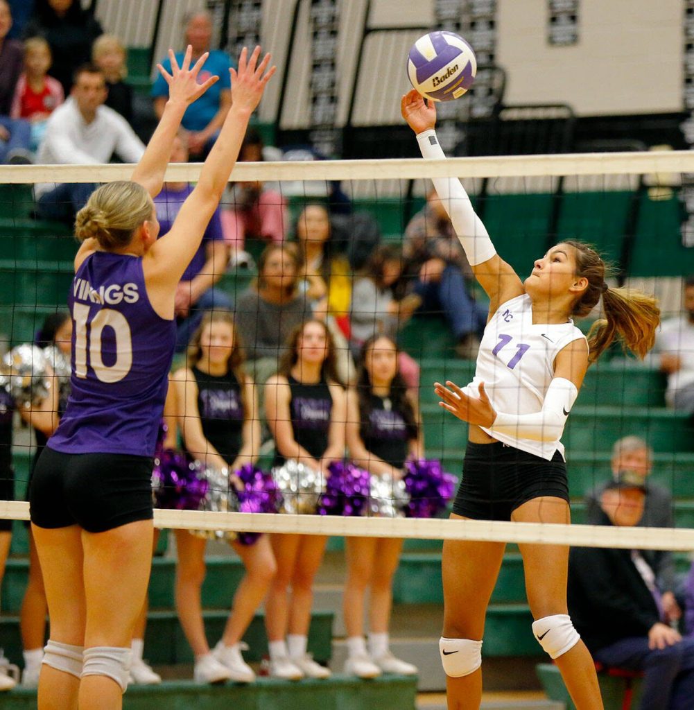 North Creeks Jocelyn Grieser sends the ball back over the net against Lake Stevens during the Wesco 4A district 1/2 championship match Saturday, Nov. 11, 2023, at Henry M. Jackson High School in Mill Creek, Washington. (Ryan Berry / The Herald)