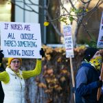 Providence nurses picket in front of the hospital during the first day of their planned five-day strike Tuesday, Nov. 14, 2023, at Providence Regional Medical Center in Everett, Washington. (Ryan Berry / The Herald)