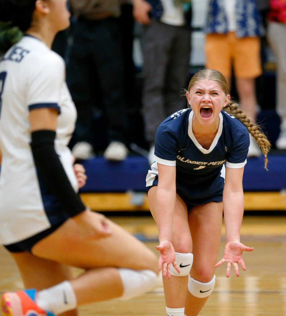 Glacier Peaks Tessa Mossburg celebrates her teams point against Lake Stevens on Oct. 10 at Glacier Peak High School in Snohomish. (Ryan Berry / The Herald)