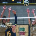 Lynnwoods Hannah Johnson (25) and Abbie Orr (4) move to block during a volleyball game against Shorecrest on Oct. 3 at Shorecrest High School in Shoreline. (Annie Barker / The Herald)