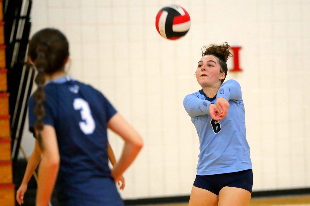 Meadowdales Sofia Brockmeyer receives a serve during a Class 3A District tournament semifinal match against Shorewood on Nov. 9 at Marysville Pilchuck High School in Marysville. (Ryan Berry / The Herald)