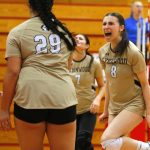 Lynnwood’s Ady Martin, right, celebrates with her teammates during a Wesco 3A District volleyball matchup against Shorecrest on Thursday, Nov. 9, 2023, at Marysville Pilchuck High School in Marysville, Washington. (Ryan Berry / The Herald)