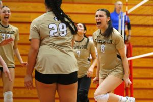 Lynnwood’s Ady Martin, right, celebrates with her teammates during a Wesco 3A District volleyball matchup against Shorecrest on Thursday, Nov. 9, 2023, at Marysville Pilchuck High School in Marysville, Washington. (Ryan Berry / The Herald)