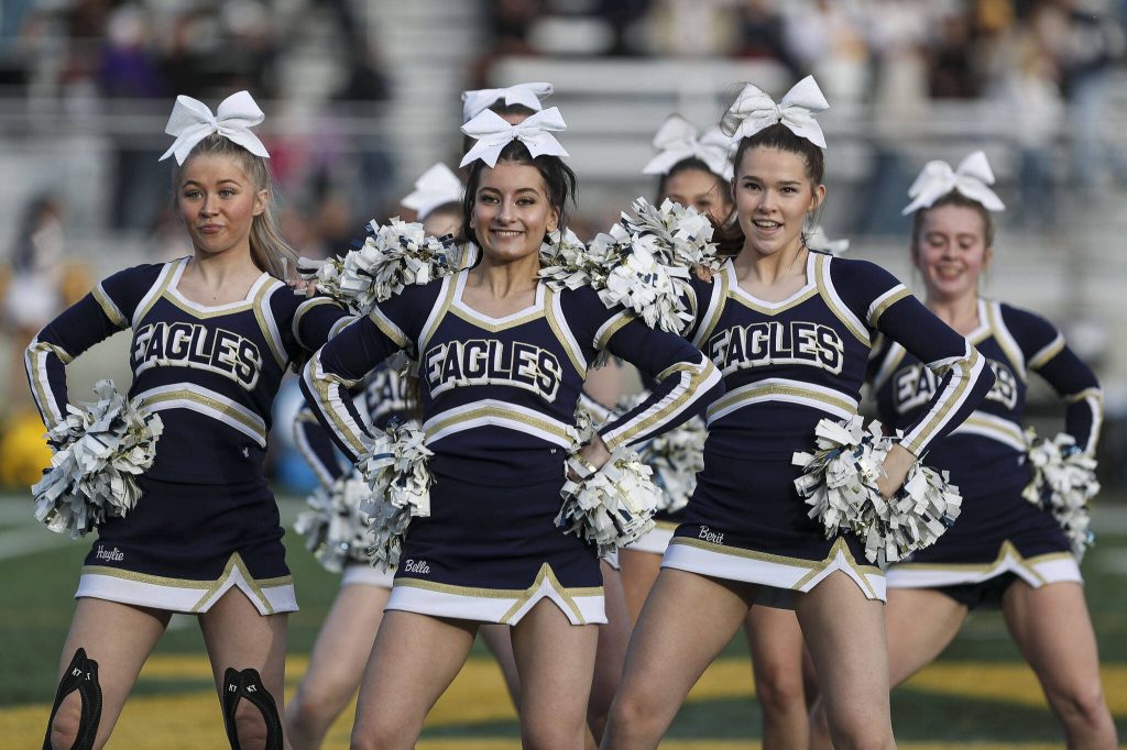 Arlington cheerleaders perform during the Arlington and Bellevue Class 3A state quarterfinal game at Arlington High School in Arlington, Washington on Saturday, Nov. 18, 2023. Arlington lost, 35-17. (Annie Barker / The Herald)
